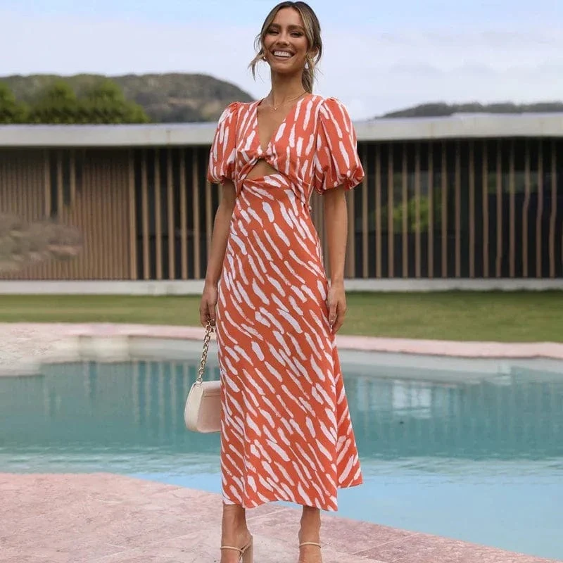 Robe de cocktail orange midi manches bouffantes