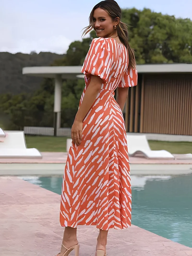 Robe de cocktail orange midi manches bouffantes