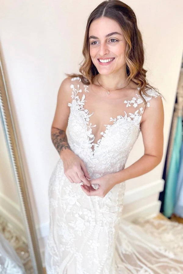 Robe de mariée élégante ivoire coupe trapèze, col en V, en dentelle et tulle