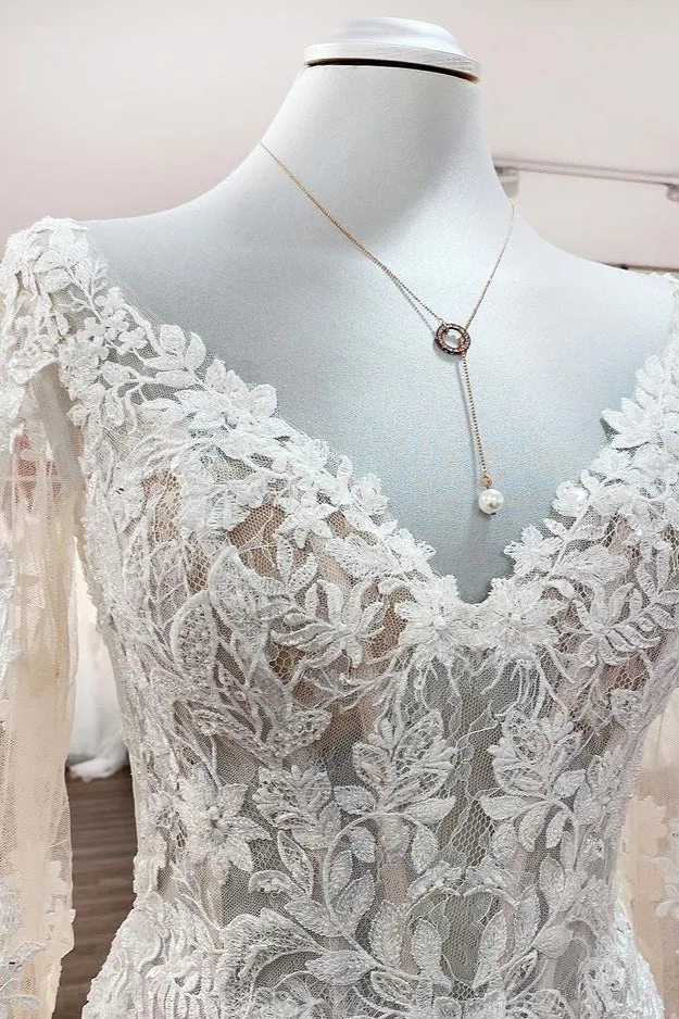 Robe de mariée princesse à manches longues et appliqués en dentelle