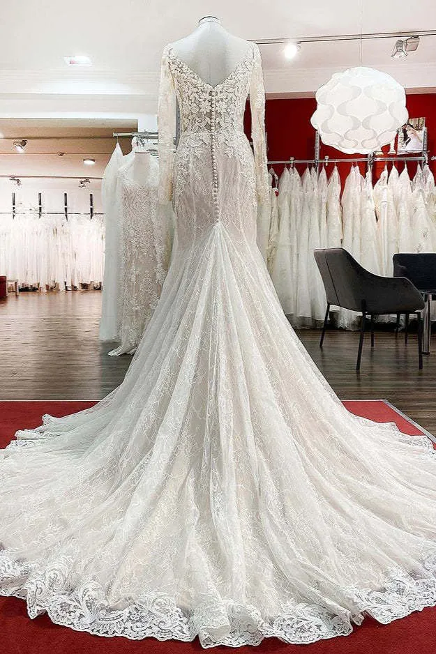 Robe de mariée princesse à manches longues et appliqués en dentelle