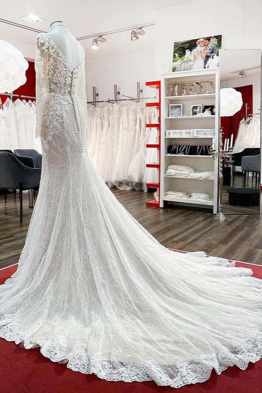 Robe de mariée princesse à manches longues et appliqués en dentelle