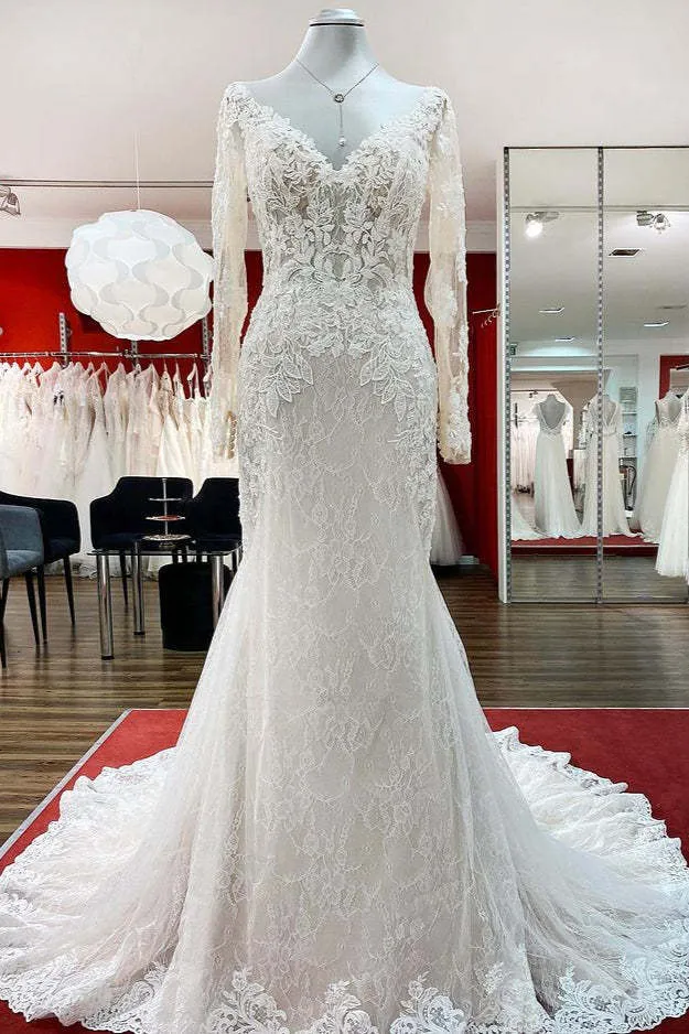 Robe de mariée princesse à manches longues et appliqués en dentelle