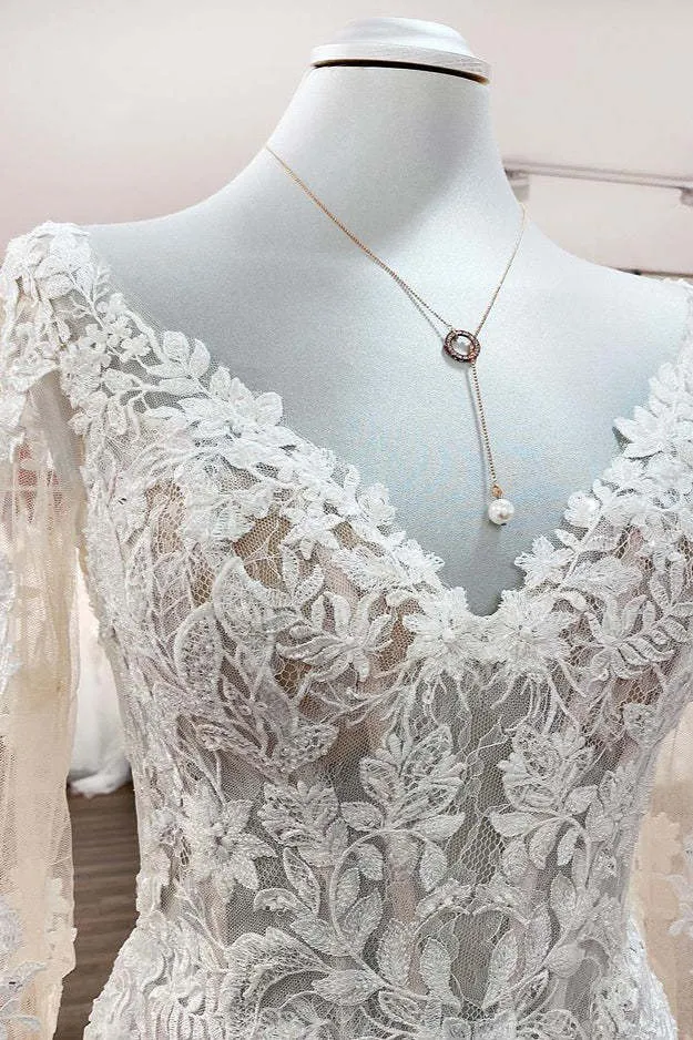Robe de mariée princesse à manches longues et appliqués en dentelle
