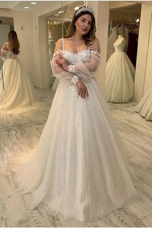 Robe de mariée élégante coupe trapèze à bretelles spaghetti et manches longues