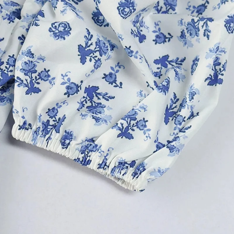 Robe fleurie midi manches courtes