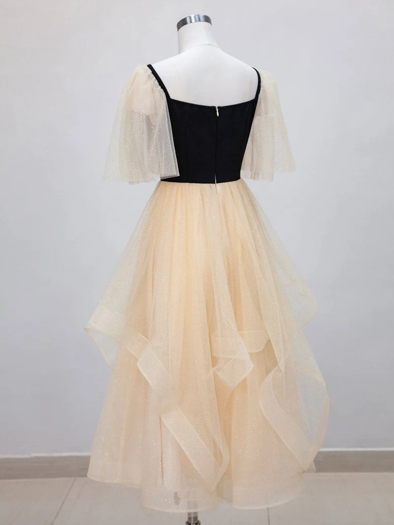 Robe de bal noire avec haut et bas champagne, longueur thé