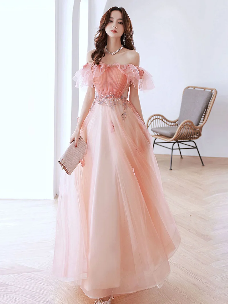 Robe de bal longue trapèze rose pêche à épaules dénudées
