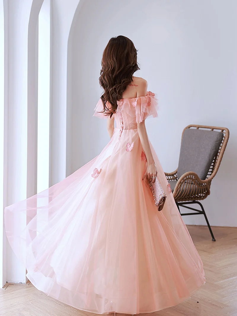 Robe de bal longue trapèze rose pêche à épaules dénudées