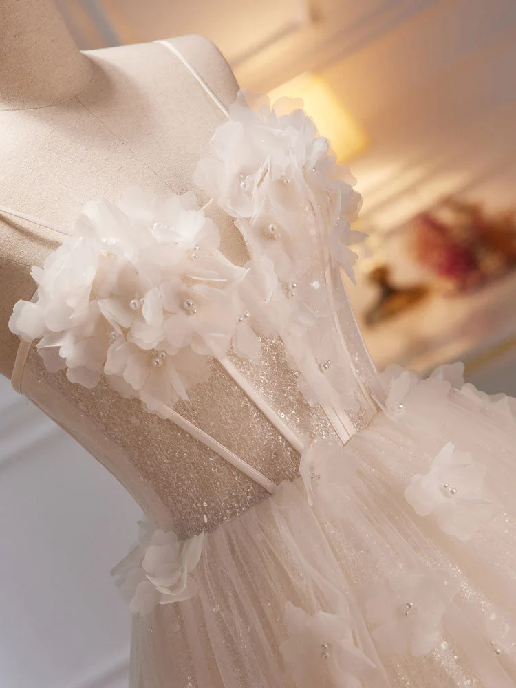 Robe de mariée ivoire transparente à bretelles spaghetti