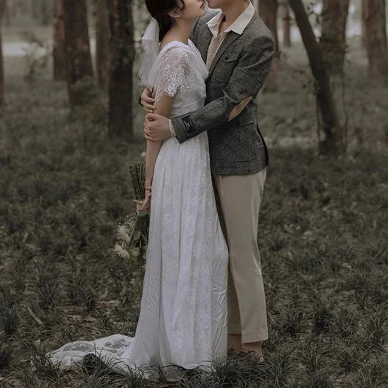 Robe de mariée en dentelle bohème fluide de style campagnard