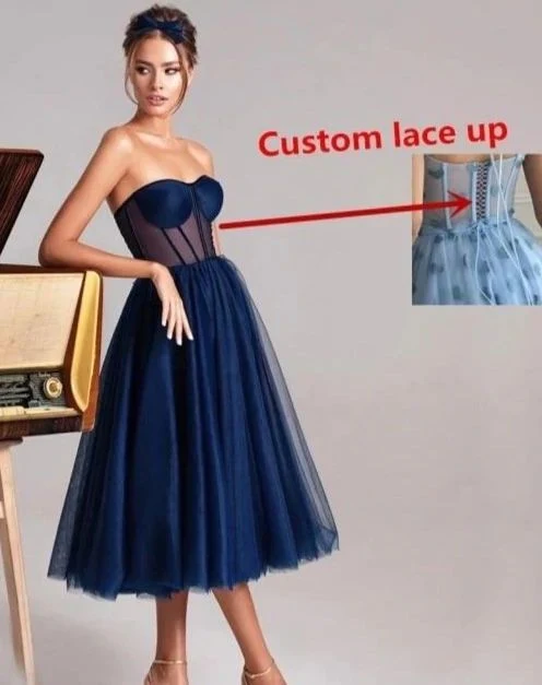 Robe mi-longue formelle en tulle vert émeraude avec haut corset
