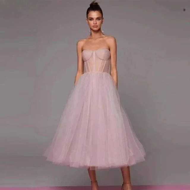 Robe mi-longue formelle en tulle vert émeraude avec haut corset