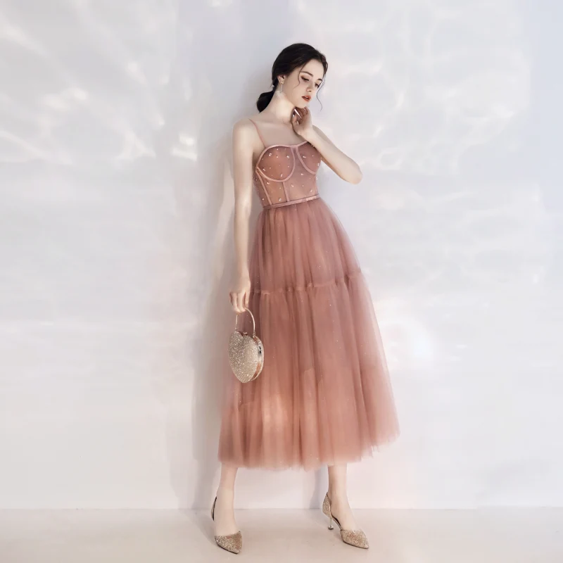 Robe de bal vintage longueur thé rose pêche