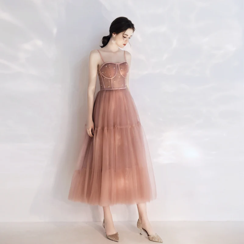Robe de bal vintage longueur thé rose pêche