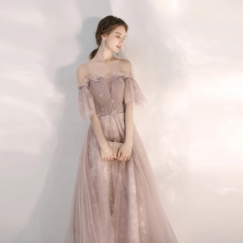 Robe de bal longue beige fée fluide