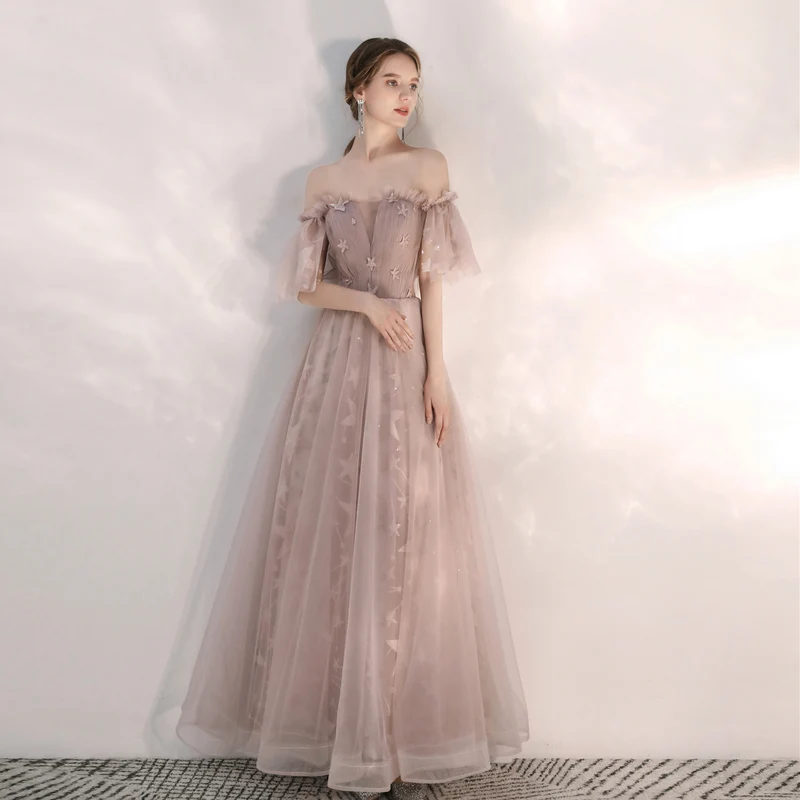 Robe de bal longue beige fée fluide