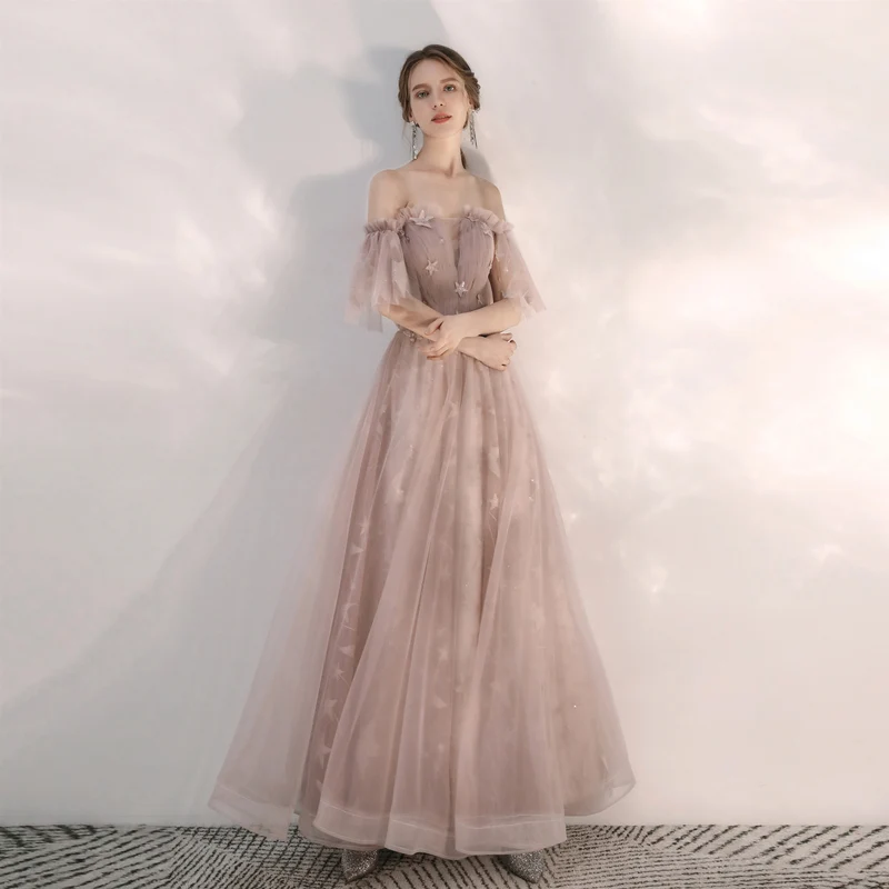 Robe de bal longue beige fée fluide