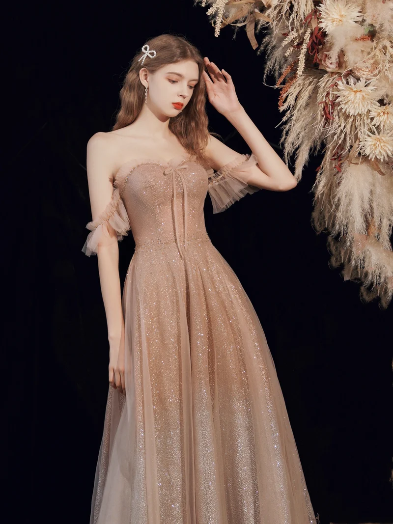 Robe de bal longue à paillettes champagne scintillantes