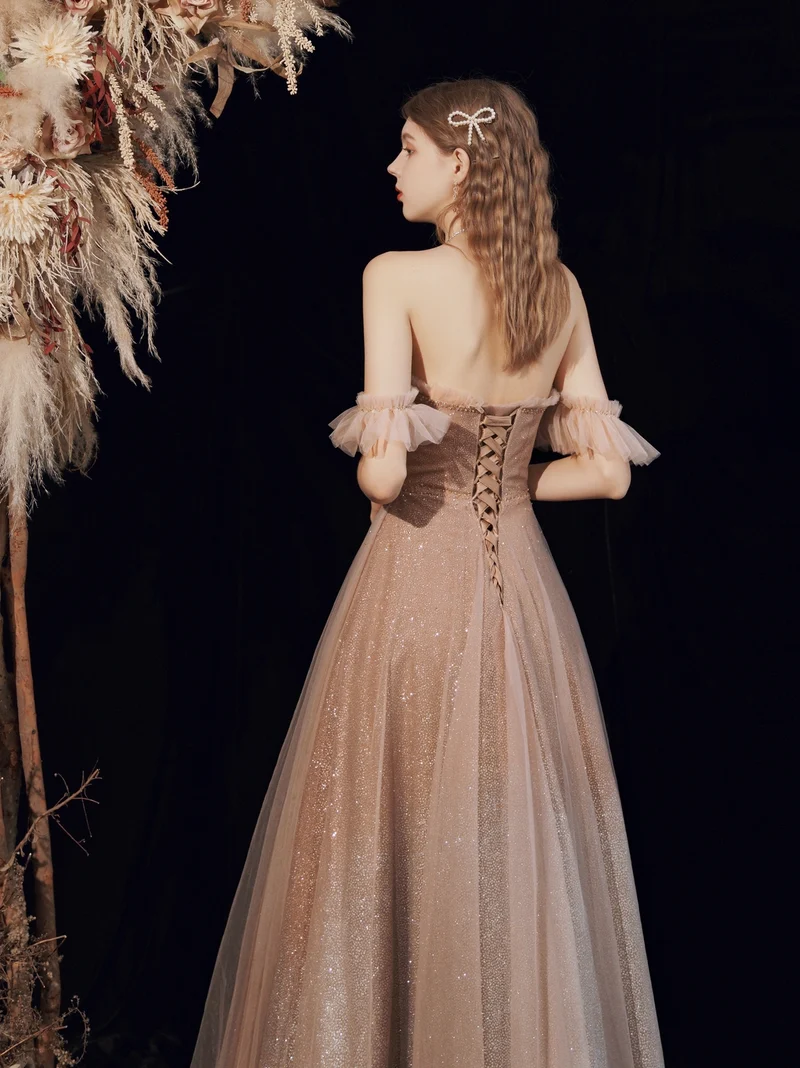 Robe de bal longue à paillettes champagne scintillantes