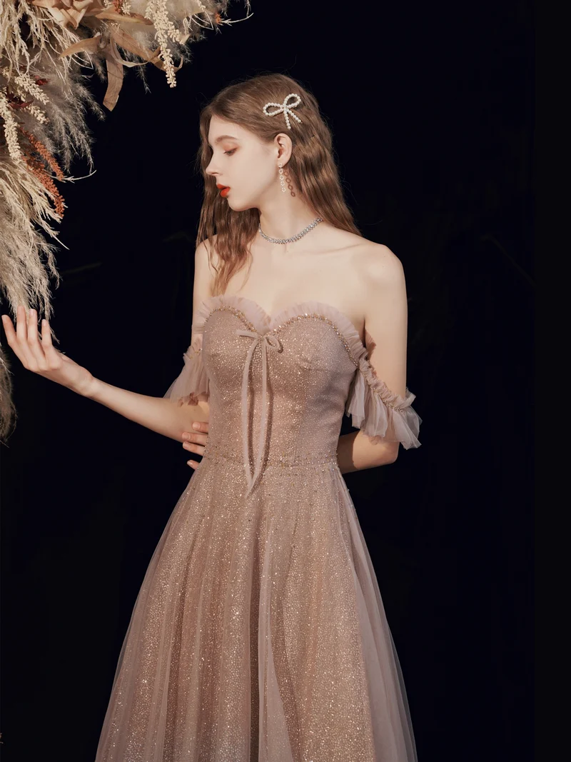 Robe de bal longue à paillettes champagne scintillantes