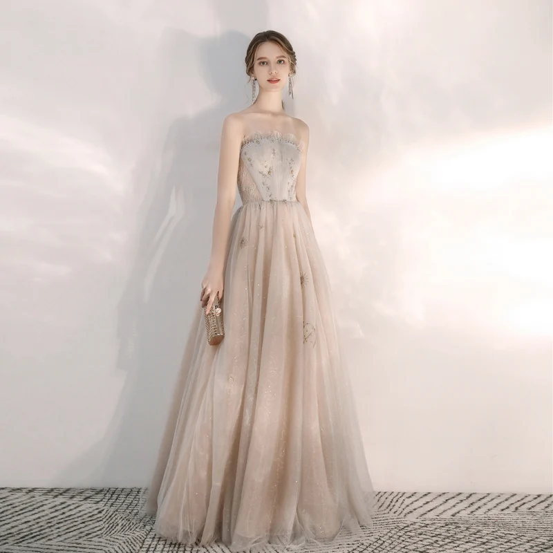 Robe de bal formelle champagne sans bretelles unique