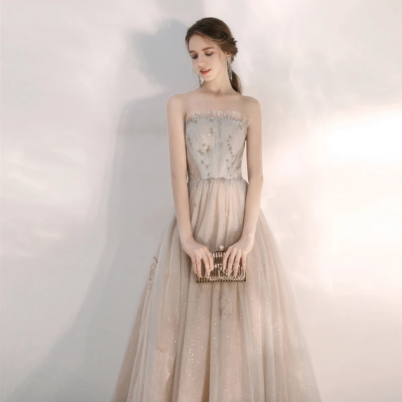 Robe de bal formelle champagne sans bretelles unique