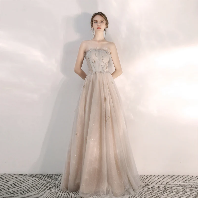 Robe de bal formelle champagne sans bretelles unique