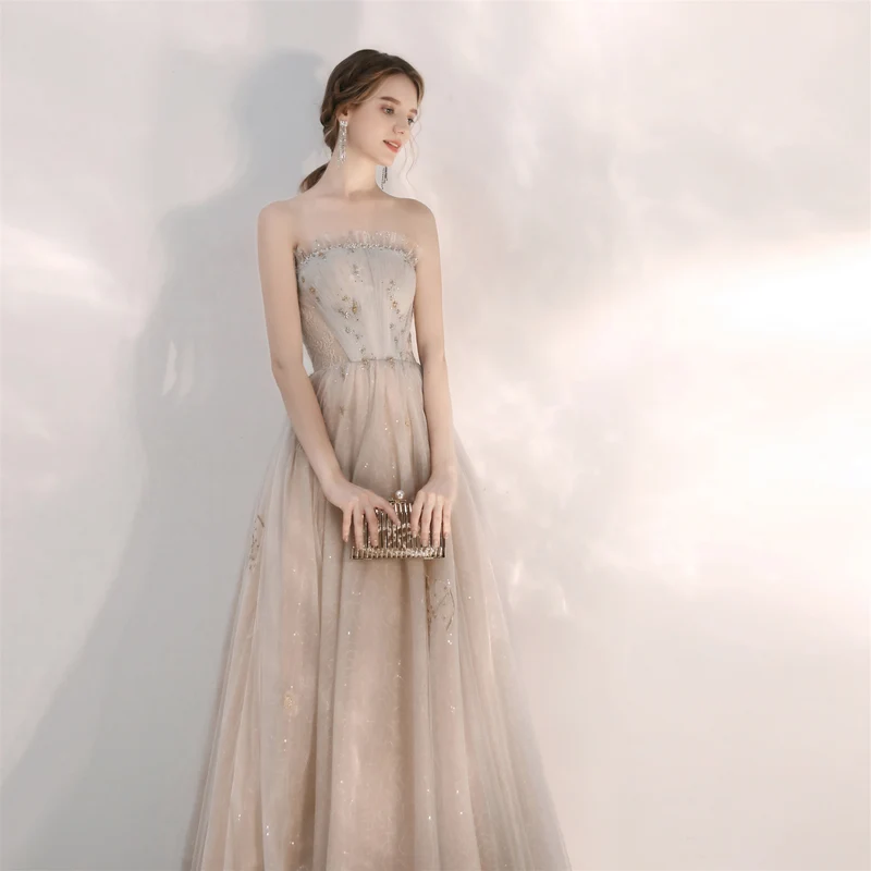 Robe de bal formelle champagne sans bretelles unique