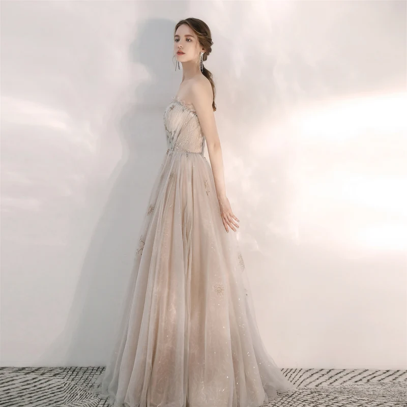 Robe de bal formelle champagne sans bretelles unique