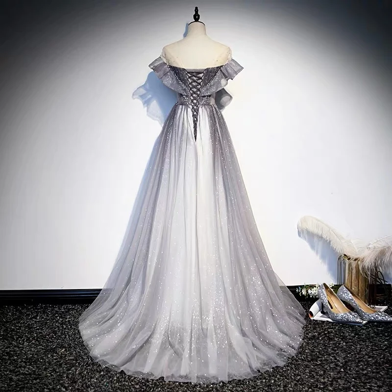 Robe de bal longue en tulle dégradé gris pailleté