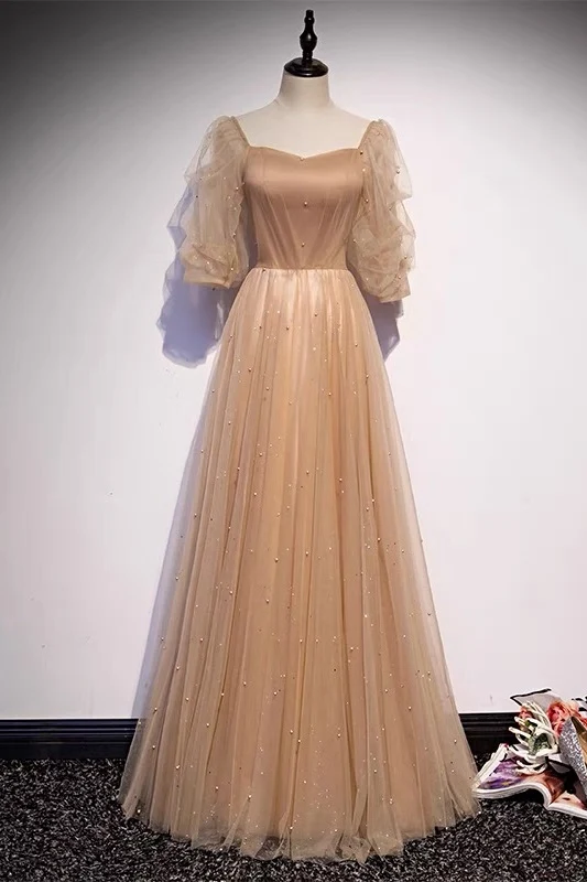 Robe de bal fluide champagne avec manches