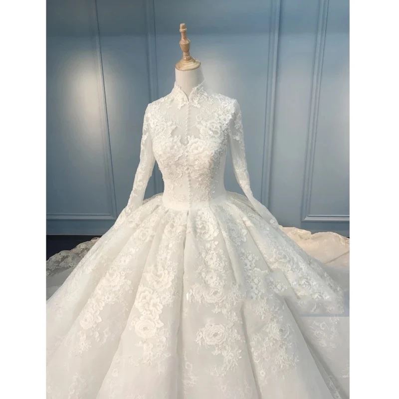 Robe de mariée de luxe musulmane modeste à manches longues en dentelle avec traîne longue