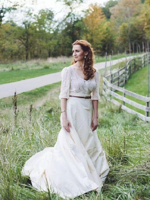 Robe de mariée ample de style campagnard avec haut court et manches séparées