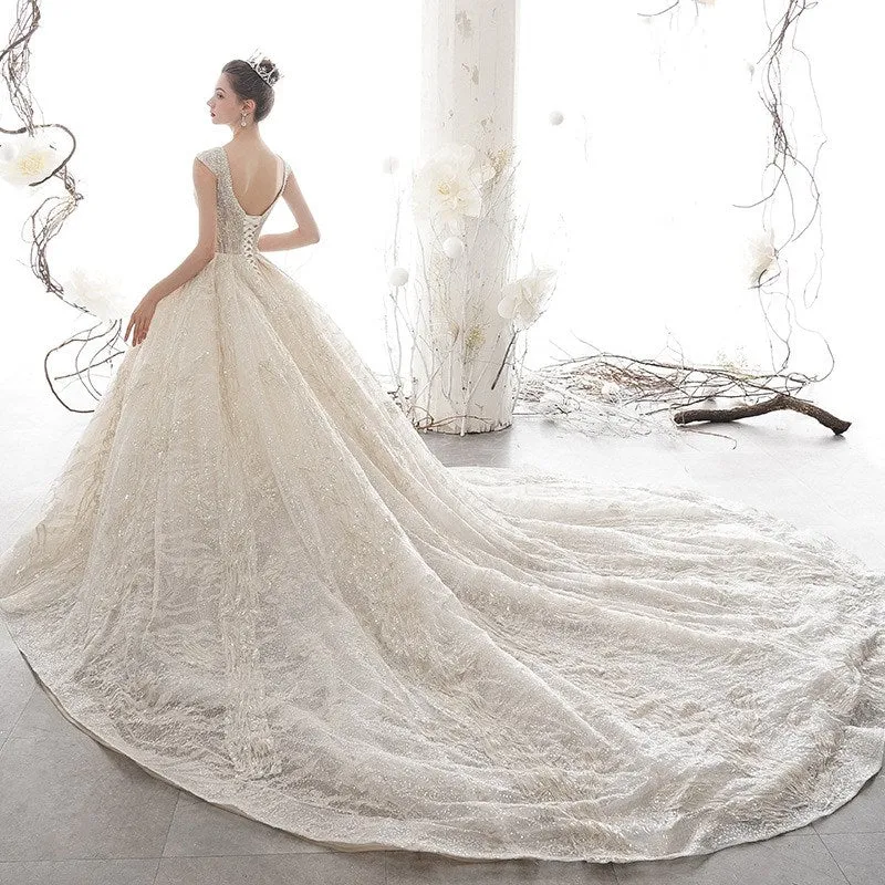 Robe de mariée robe de bal sans manches à col en V et paillettes champagne clair