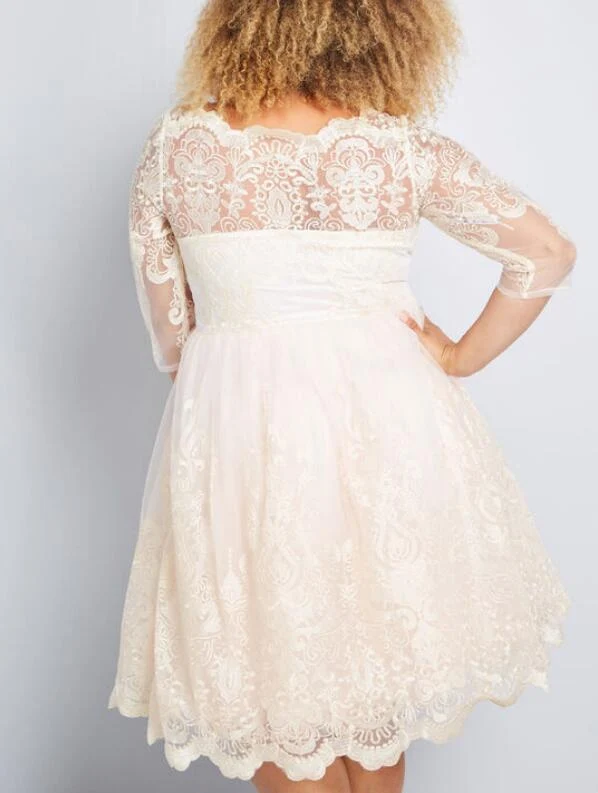 Robe de mariée Rockabilly en dentelle à manches longues et longueur thé