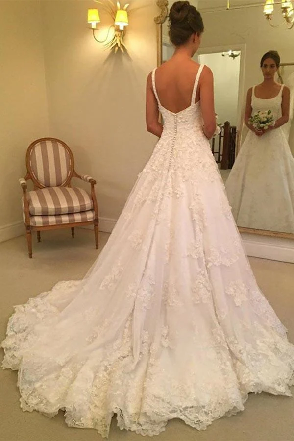 Robe de mariée en dentelle à col rond et coupe trapèze à couper le souffle