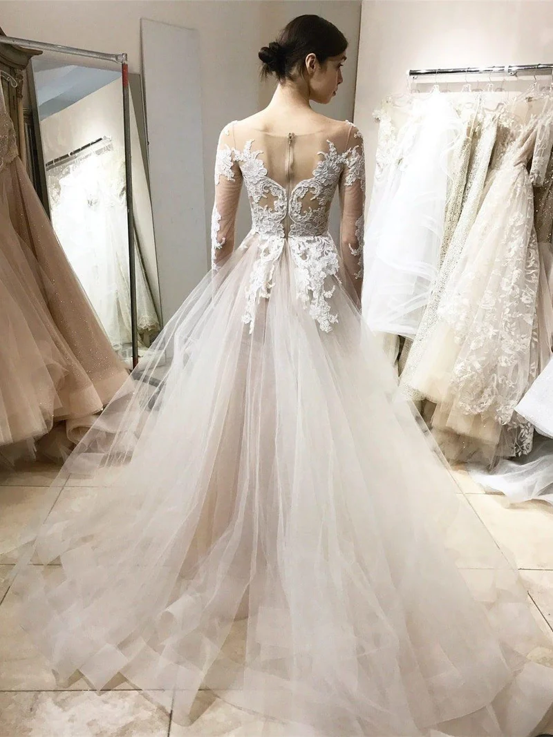 Fée romantique à manches longues élégante dentelle haut robe de mariée en tulle avec manches