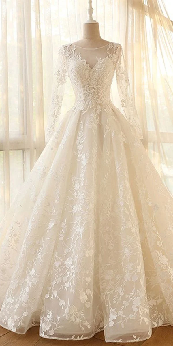 Robe de mariée glamour modeste à col bijou et manches longues
