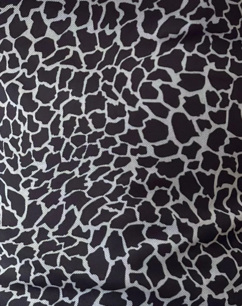 Jaridah - Top slouch asymétrique en girafe noir et crème