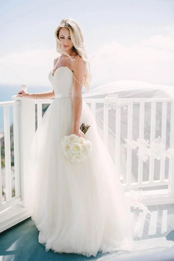 Robe de mariée trapèze en tulle avec bretelles spaghetti et princesse de campagne simple
