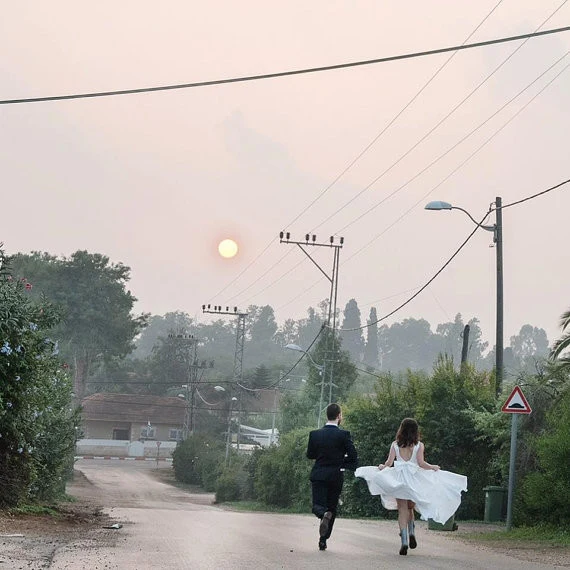 Robe de mariée vintage à col en V et longueur thé des années 50 avec poches