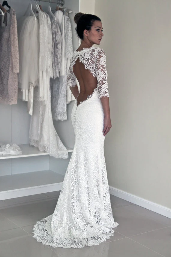 Robe de mariée longue sirène vintage en dentelle à dos ouvert avec manches