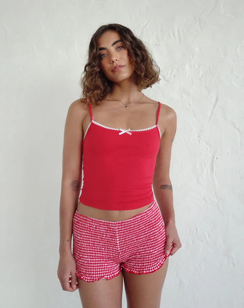 Top de gilet Suna en rouge tango avec bordure ivoire