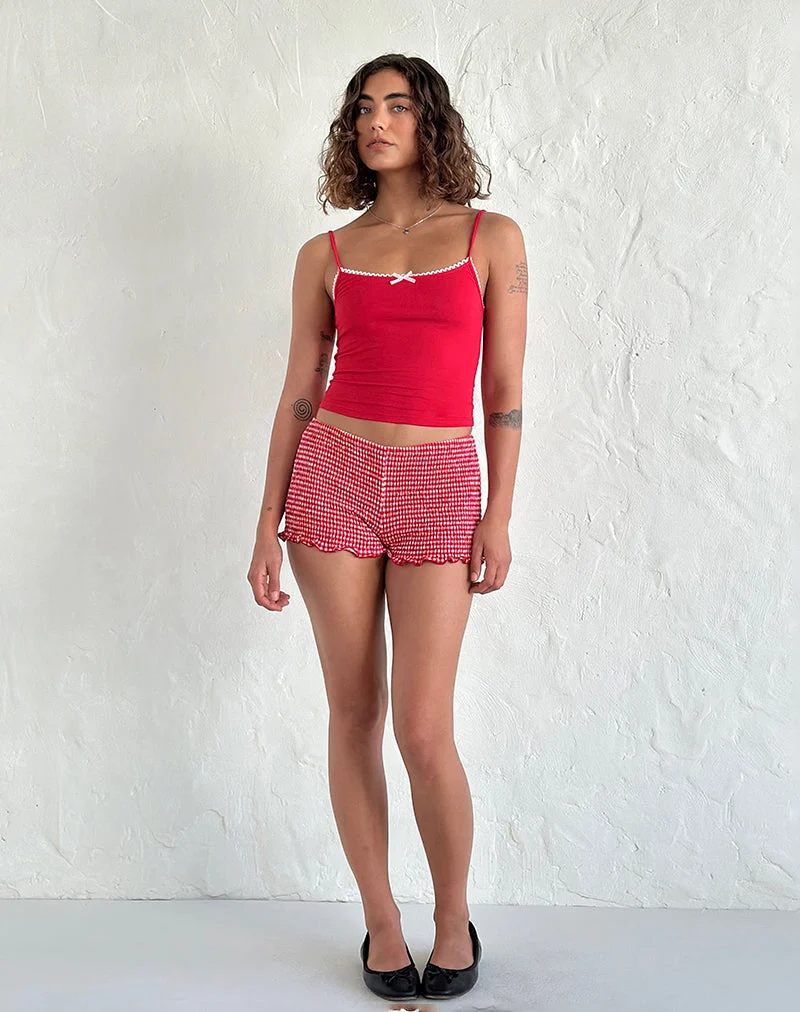 Top de gilet Suna en rouge tango avec bordure ivoire