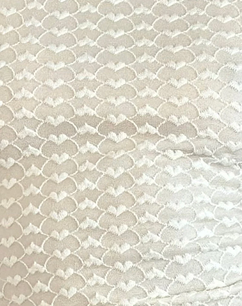 Mini robe Sechium en dentelle au cœur Ivoire