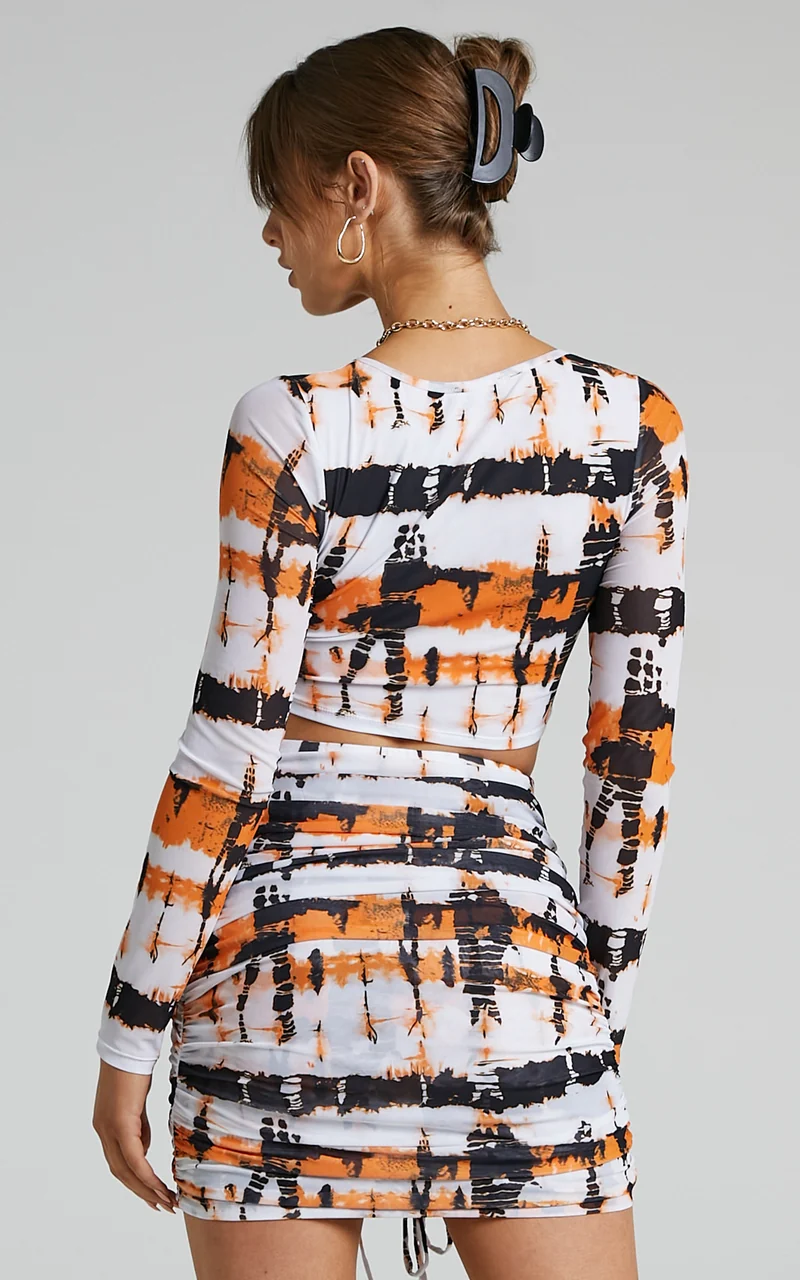 BY DYLN - Odette Mini Skirt in Orange Printed Mesh