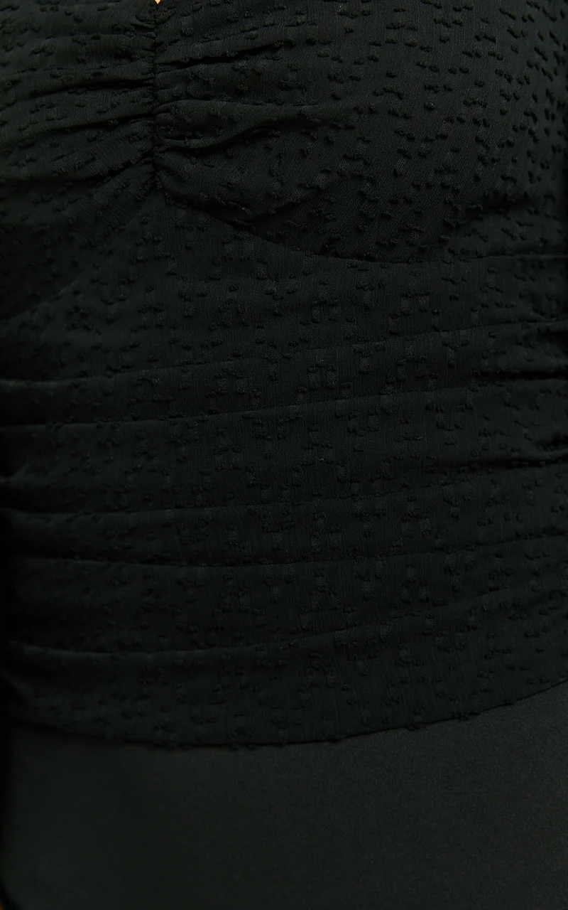 Lunara Bodysuit - Textured Ballon Sleeve Bodysuit in Black