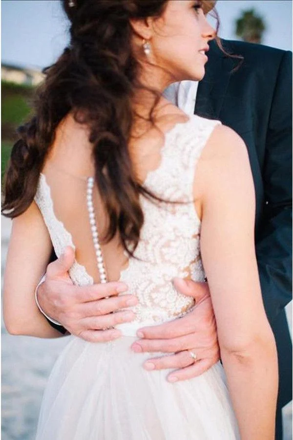 Robe de mariée bohème avec haut en dentelle et dos en V, été, plage