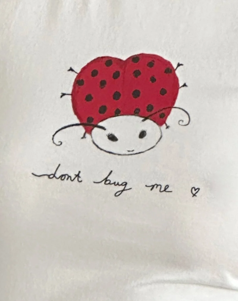 T-shirt Izzy Baby en blanc cassé 'Dont Bug Me' (Ne m'embêtez pas)